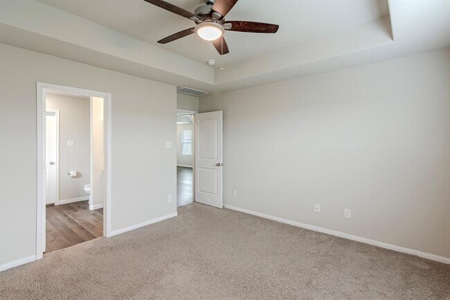 Building Photo - 4922 Blue Jacaranda Wy