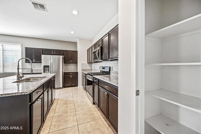 Building Photo - 31027 W Mulberry Dr