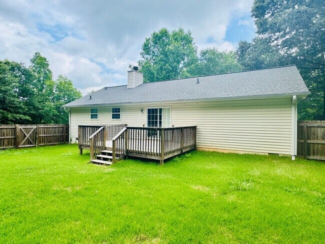 Building Photo - Spacious 4-Bedroom Home on Large Corner Lo...