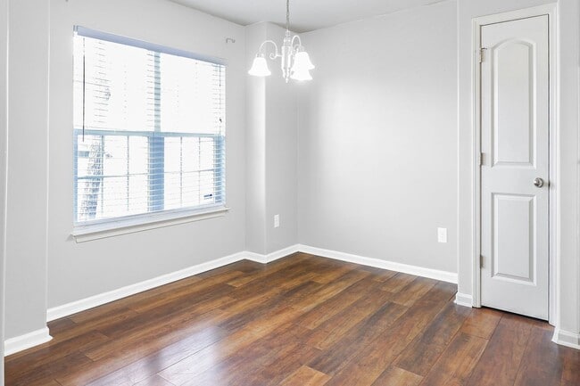 Building Photo - pdated 2BR/2.5BA Townhome with Private Fenced Patio