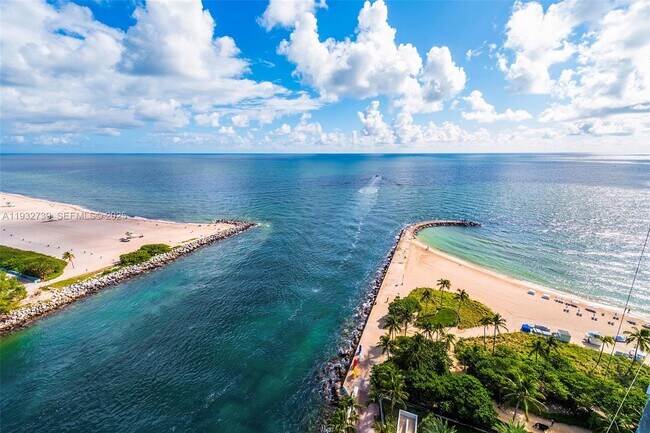 Building Photo - 10295 Collins Ave