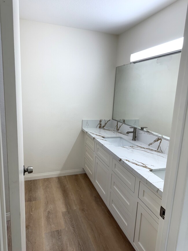 Ensuite bath double sinks with new cabinets, counters, fixtures - 1249 Mission Verde Dr