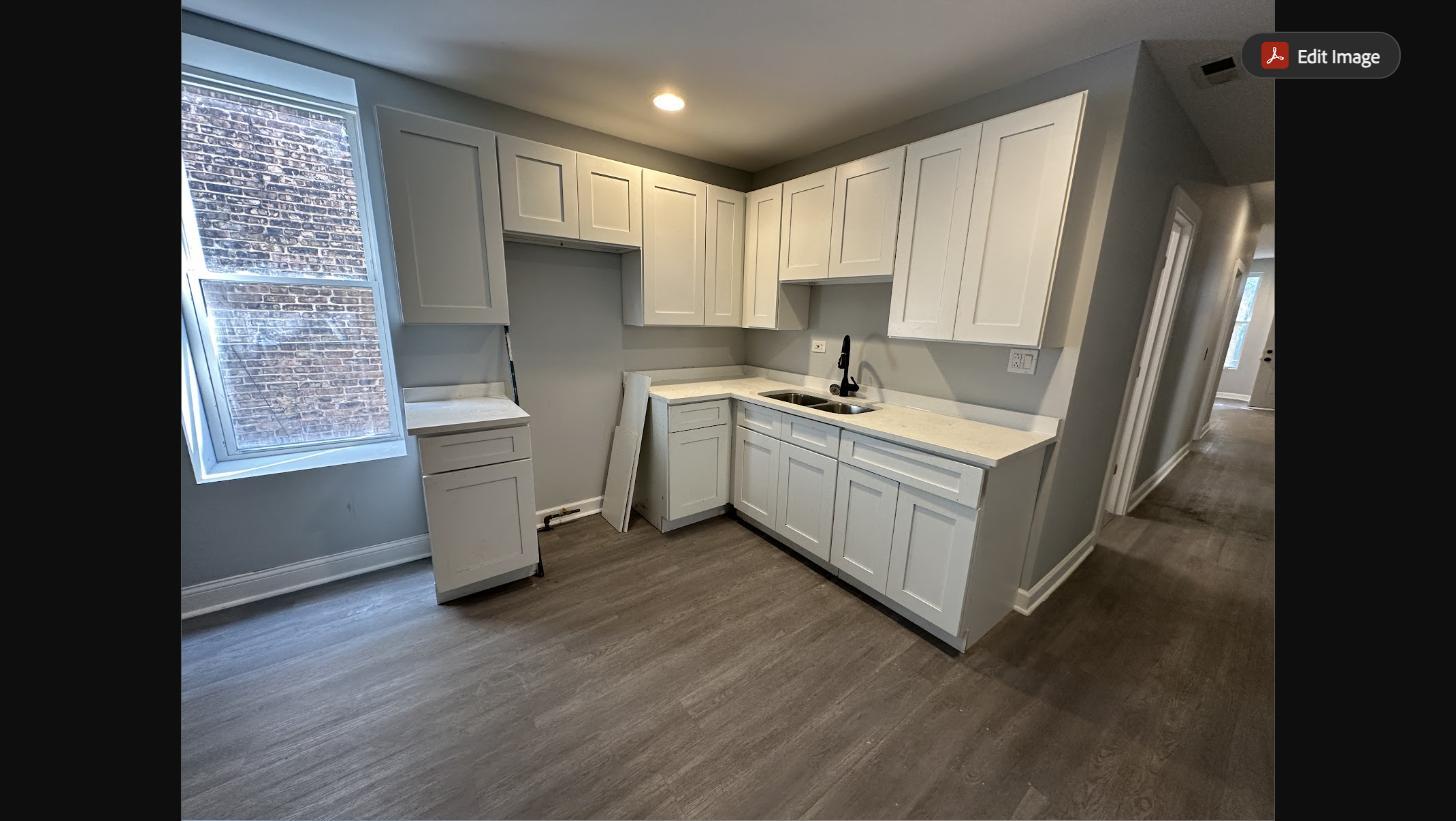 Kitchen with new countertops and stainless steel appliances - 5653 S May St
