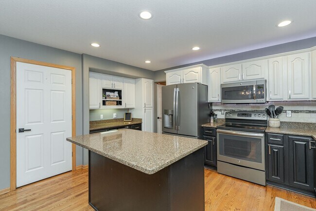 Building Photo - Spacious Home With Finished Basement And 3 Car Garage