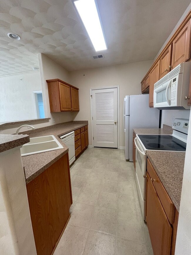 Building Photo - Woodsworth Village in West Neck 55+