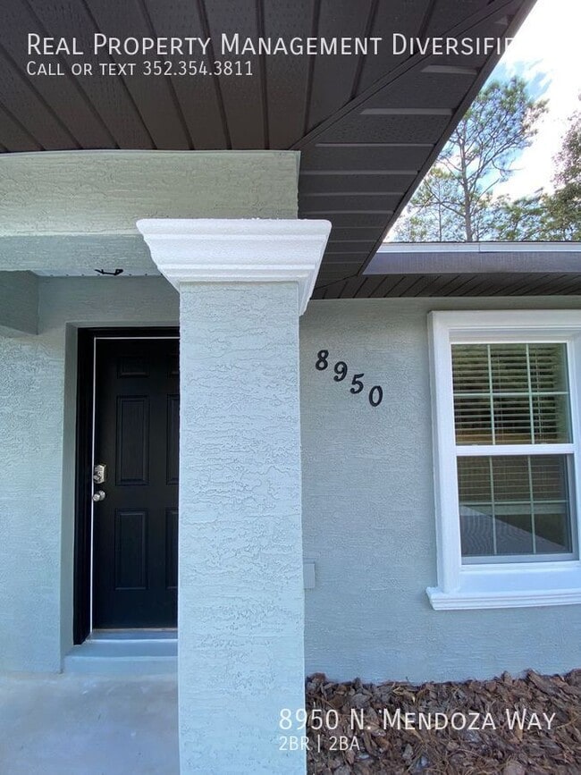 Building Photo - 8950 N Mendoza Way