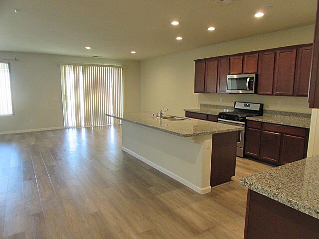 Building Photo - Spacious 5-Bedroom Home with Loft, Solar P...