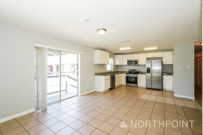 Building Photo - Newly Renovated Single Family Home | 4 BR/2BA | Partially fenced  front yard