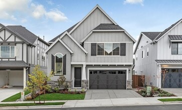 Building Photo - Bethany Stunner - 5 Bedrooms with Main-Level Bed & Bath, Modern Kitchen & Private Fenced Yard