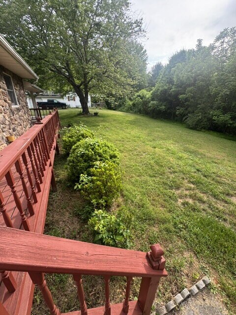 Building Photo - ½ Off First Full Month with Move-In by 8/15 • Large Yard & Deck • August App Fee Only $32. Pet-fr...
