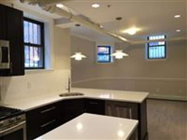 Building Photo - Garden Level Unit. No Brokers Fee, No Security Deposit, Heat and Hot Water Included, Elevator, La...
