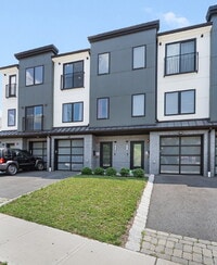 Building Photo - Movie in special, first 1/2 month rent is FREE! Charming 2-Bedroom Condo with 2 Full & 2 Half Bat...