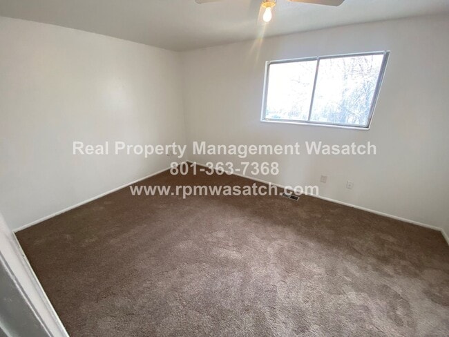 Building Photo - Check Out This Charming 3 Bedroom 1.5 Bathroom Condo in Midvale Ut!