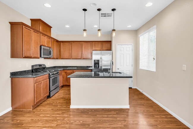 Building Photo - Modern, Guard Gated, and Close to Everything! 3-Bed Townhome Near St. Rose Parkway and Liberty Hi...