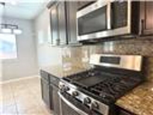 Building Photo - spacious 4 bedroom 2.5 bath home