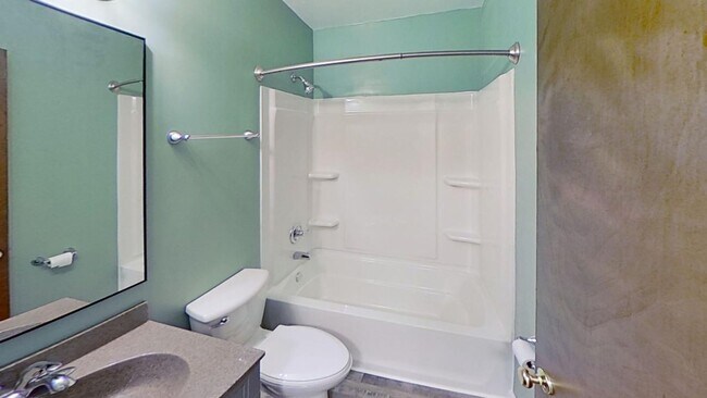 Building Photo - Updated 2BR/1BA duplex with office in partially finished basement, detached garage and across fro...