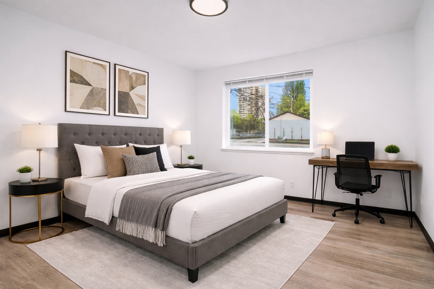 Furnished Bedroom with Queen Bed (Furnishings may vary) - 5004 7th Ave NE