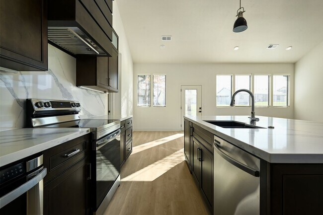 Building Photo - Stunning 2-bedroom, 2-bathroom, 2-car Single Family Home In Raymore MO