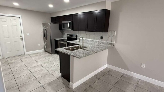 Building Photo - 979 BERKLEY ROAD Unit #3, AUBURNDALE, Florida 33823