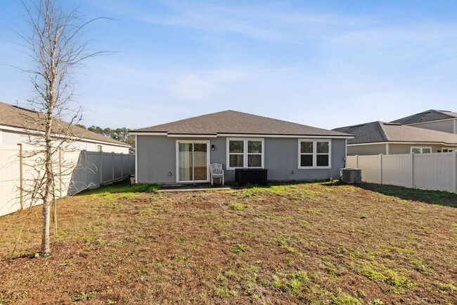 Building Photo - Like New 3 Bedroom With A Fenced Yard