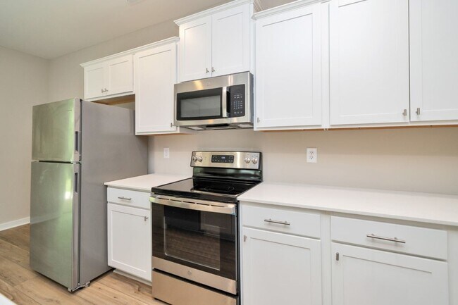 Building Photo - Move-In Special! Pay only ½ of your first ...