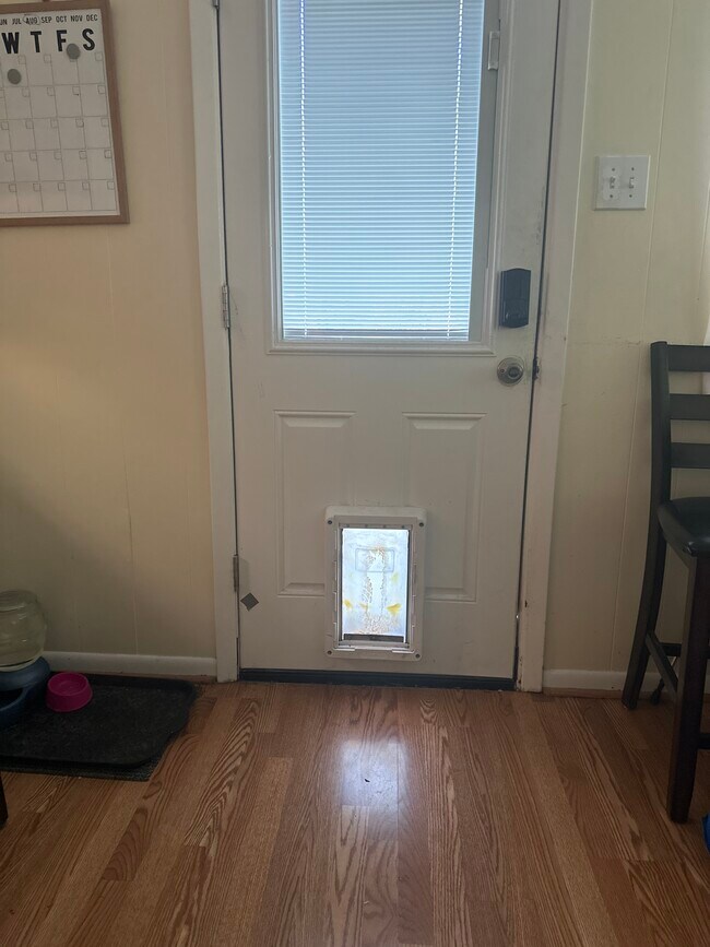 Doggie door for doing their business. - 10045 Devonshire Dr