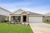 Building Photo - 4/2 Stunning Brick Home with community poo...