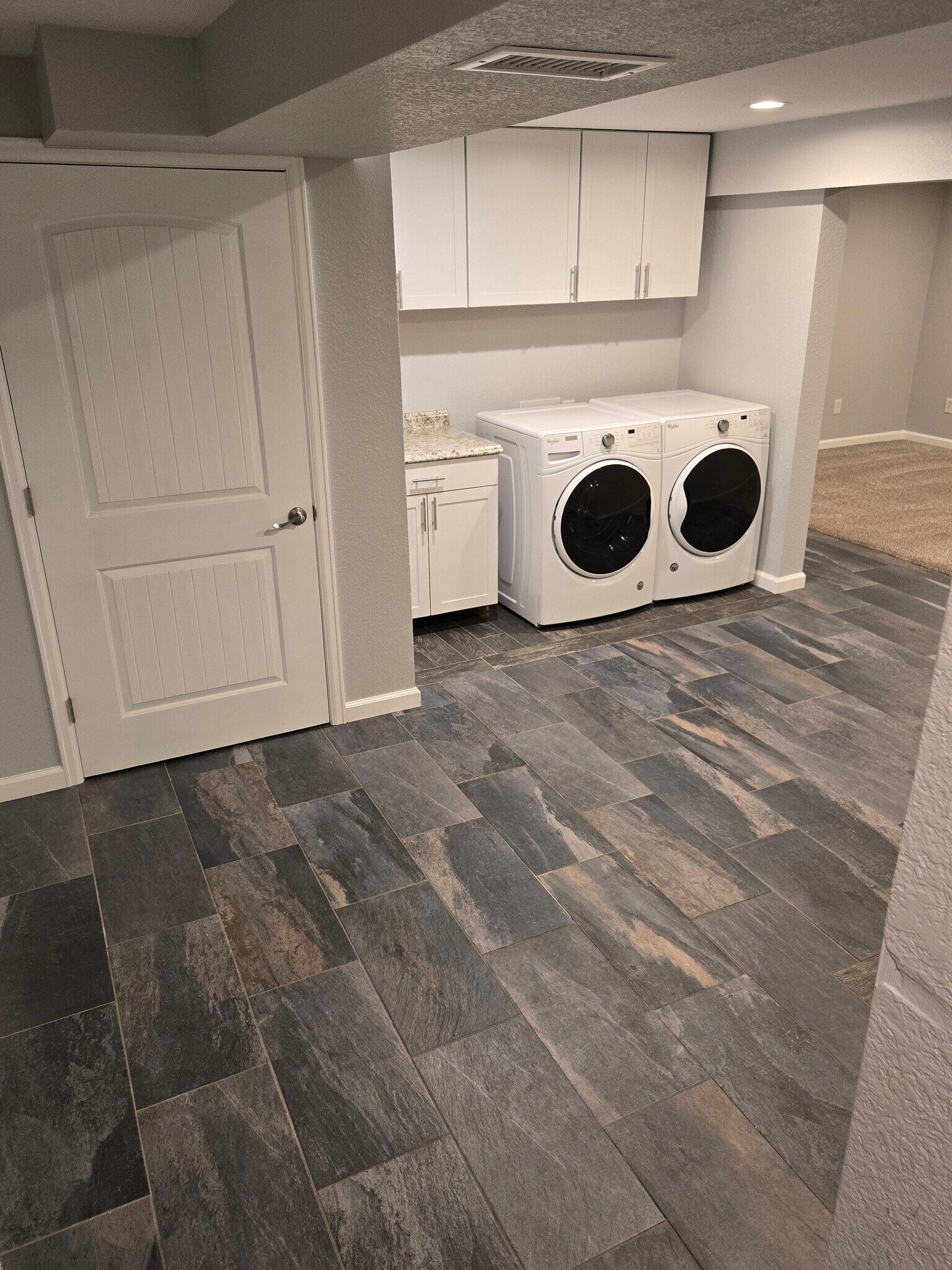 Stair landing view to Laundry and Flex Space - 8731 Field Way