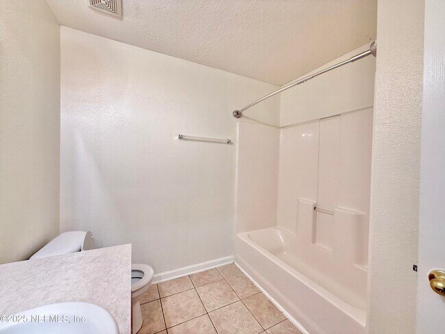 Building Photo - 6788 Manotak Oaks Dr