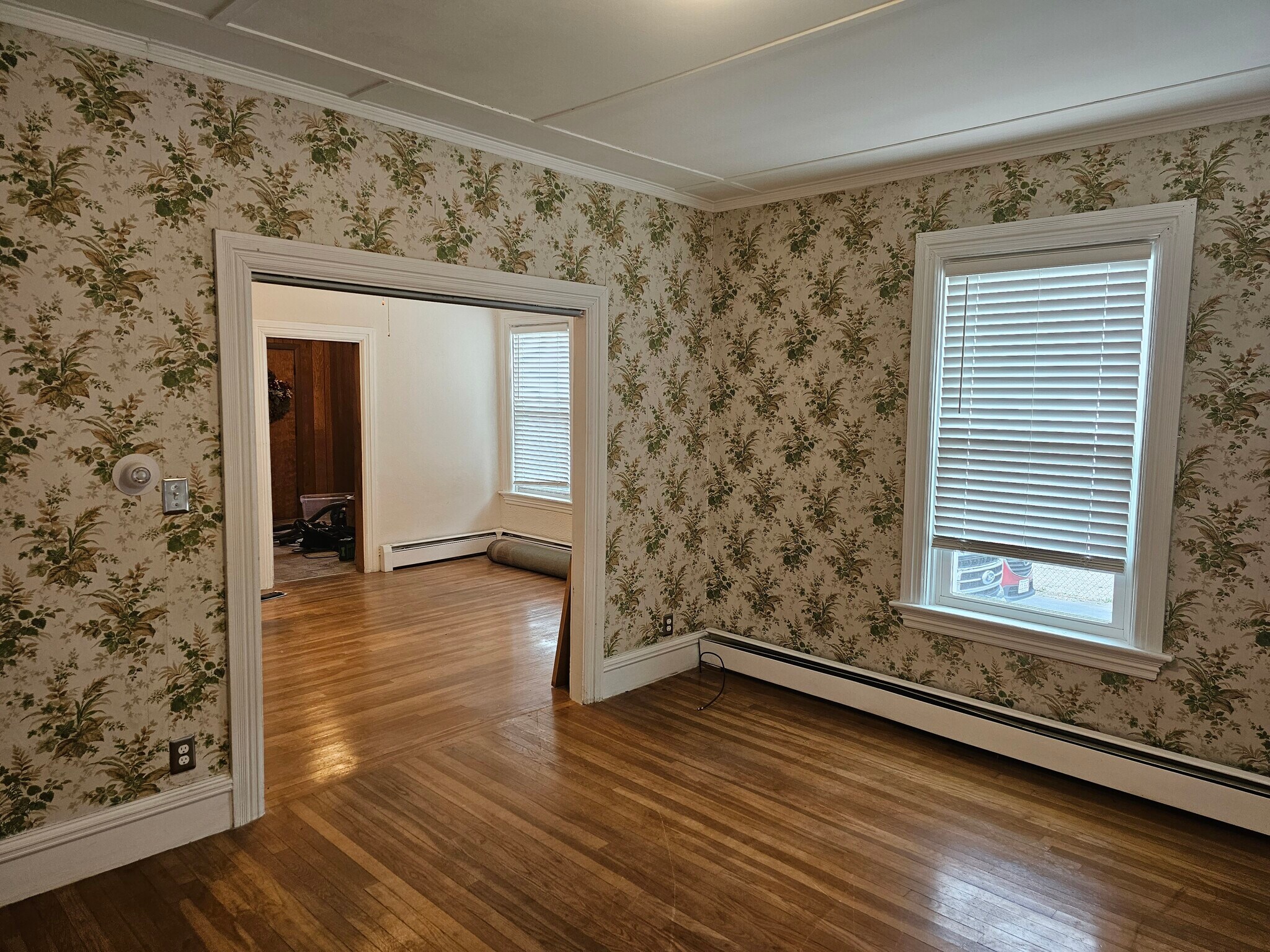 Front room towards dining room - 107 Broad St