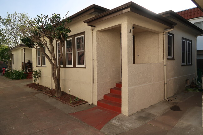 Cottage exterior--"Unit A" is the middle unit - 2058 Buena Vista Ave