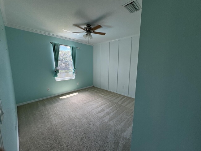 Building Photo - Spacious 5-Bedroom Pool Home with Putting ...
