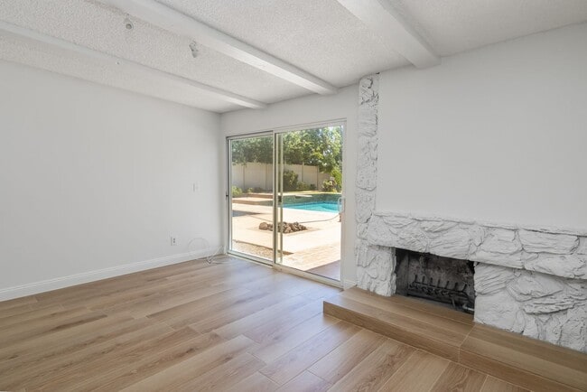 Building Photo - Spacious 3-Bedroom Home with Pool, Jacuzzi...