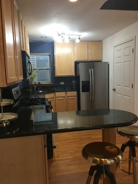 Kitchen with Stainless steel appliances - 1312 N Campbell Ave