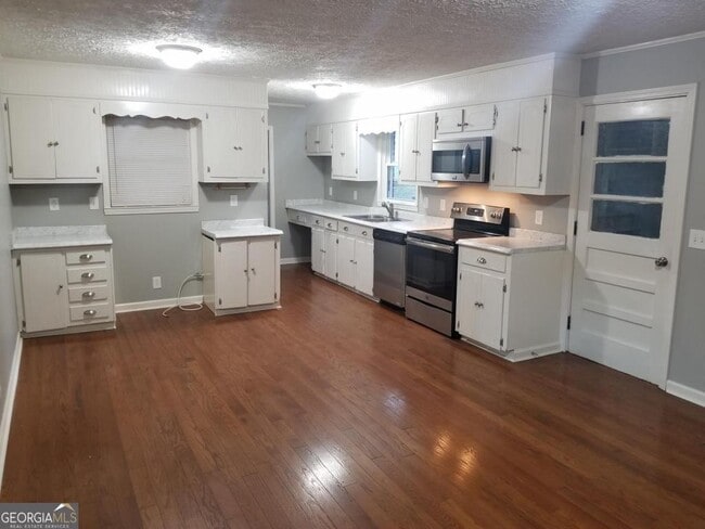 Building Photo - 5003 Calhoun Rd NE