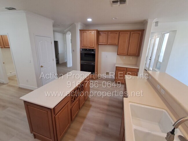 Building Photo - Action Properties R.E.S. Inc. Offering Beautiful Highland Park Single Story 3 Car, 4 Bedroom, Gar...
