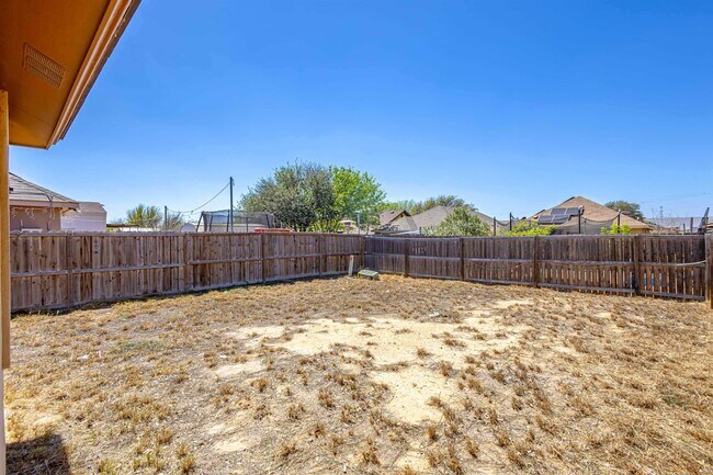 Building Photo - 4416 Wild Flower Ave
