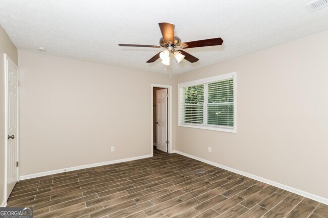 Building Photo - 9073 Woodgreen Way