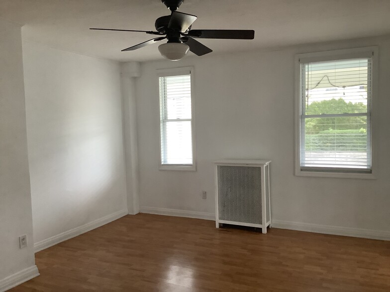 The dining room measures 13'6" by 15'10" including a closet. - 11 Jay St