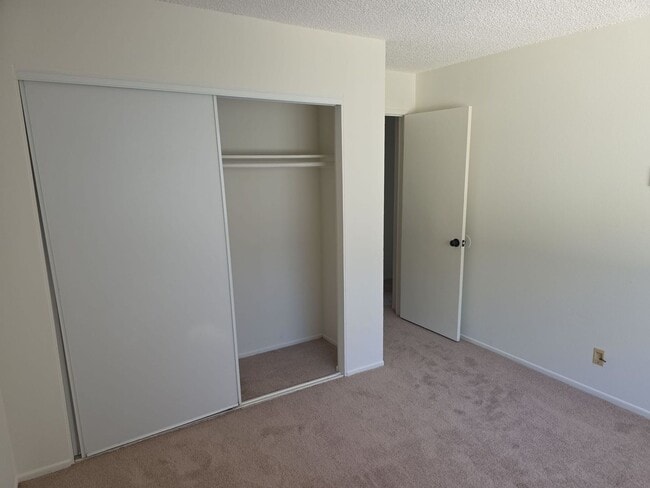 Building Photo - Popular two story condo with garage