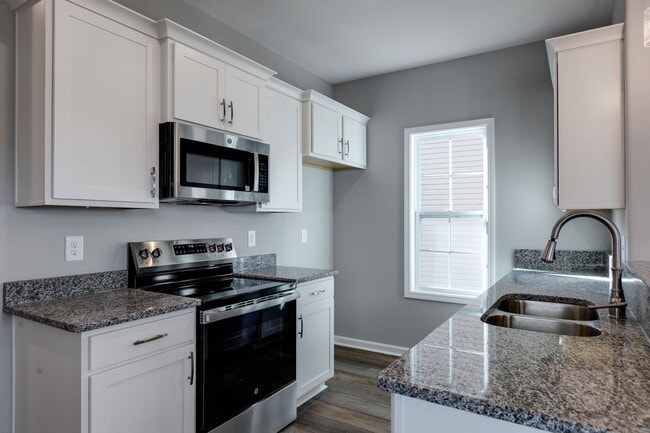 Building Photo - 1 Year of FREE Alarm Monitoring! 3 Bedroom with 2 Baths!