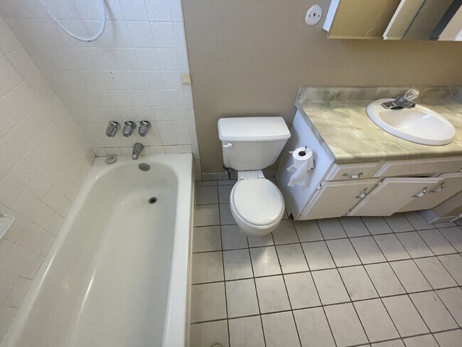 Building Photo - Spacious 6-Bed Oasis with Finished Basement & Cozy Fireplace.