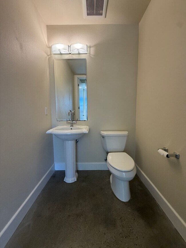 Building Photo - 7034-7046 Santero Way Lofts