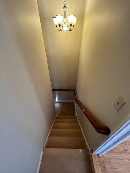 Stairs down the Family room - 880 Larkspur Dr