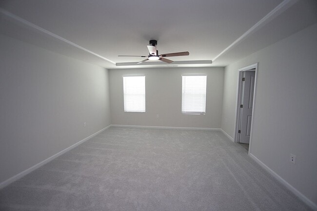 Building Photo - Beautiful 3 Bed+Bonus+2 Car Garage Townhome in New Wake Forest Community