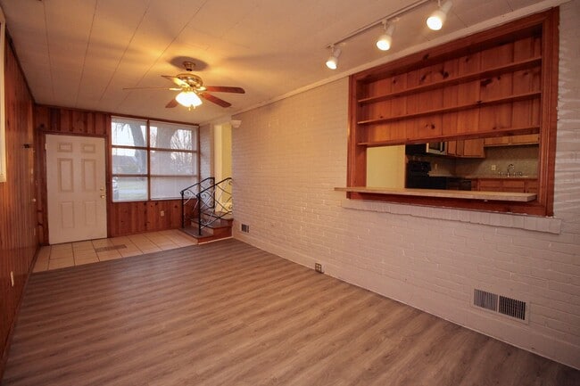 Building Photo - Adorable 3-brm brick ranch with lots of natural light, family room/den, attached garage