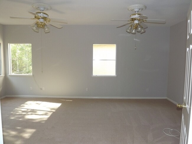 Building Photo - Gated Green Valley Ranch Townhome | 2 Bed | 2.5 Bath | 2-Car Garage