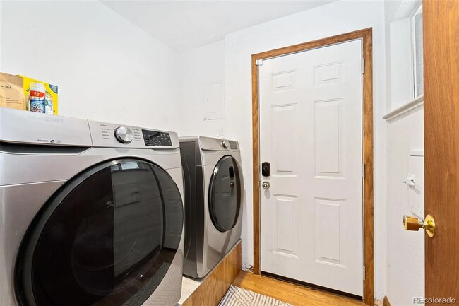 Closed-off laundry room with exterior access. - 516 Monaco Pky