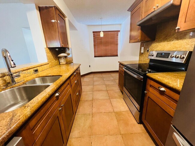 Building Photo - 4990 NW 97th Pl