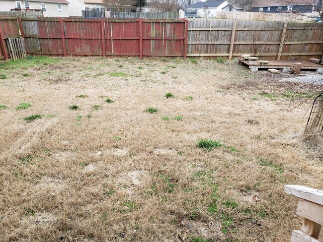 Building Photo - Close to Post! No Carpet! Lovely 3 Bed/2 Bath fenced in backyard!